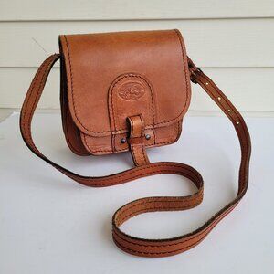 Vintage Handmade Thick brown leather crossbody saddle bag with embossed horse
